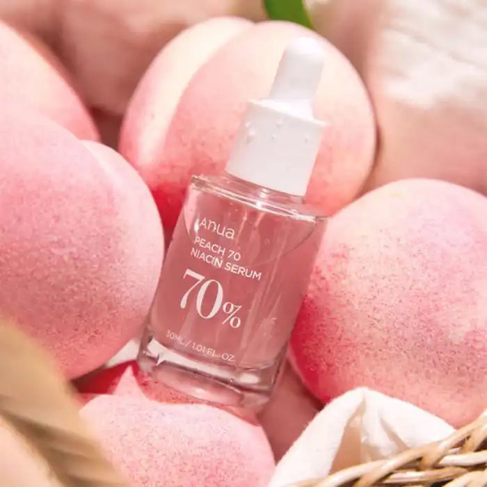 Bottle of ANUA Peach 70 Niacin Serum by Celvess Cosmetic, 30ml, with the product label and dropper cap visible.