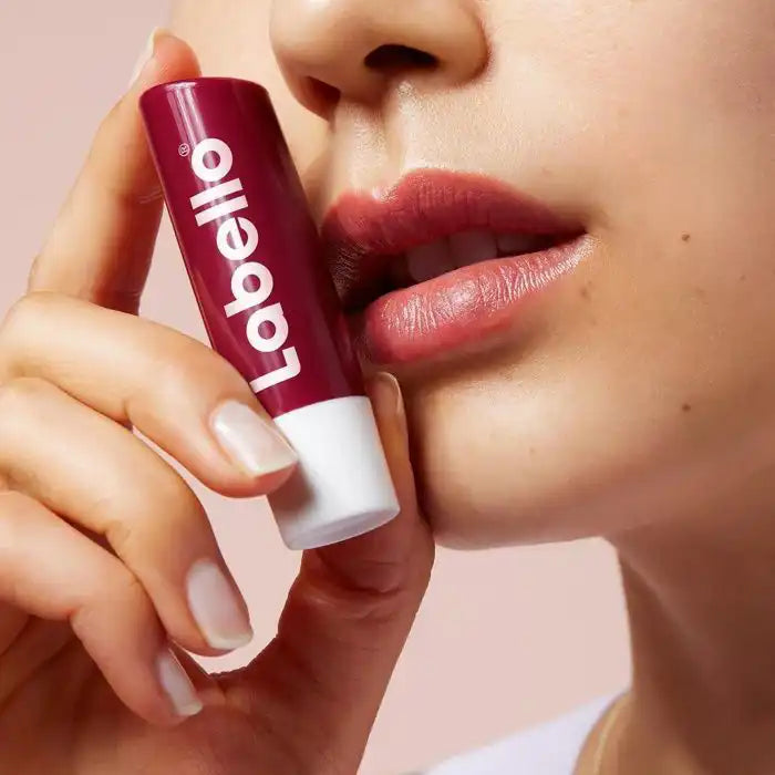 Celvess Cosmetic Labello Blackberry Shine lip balm in 4.8g, hydrating with blackberry fragrance, glossy finish on lips.