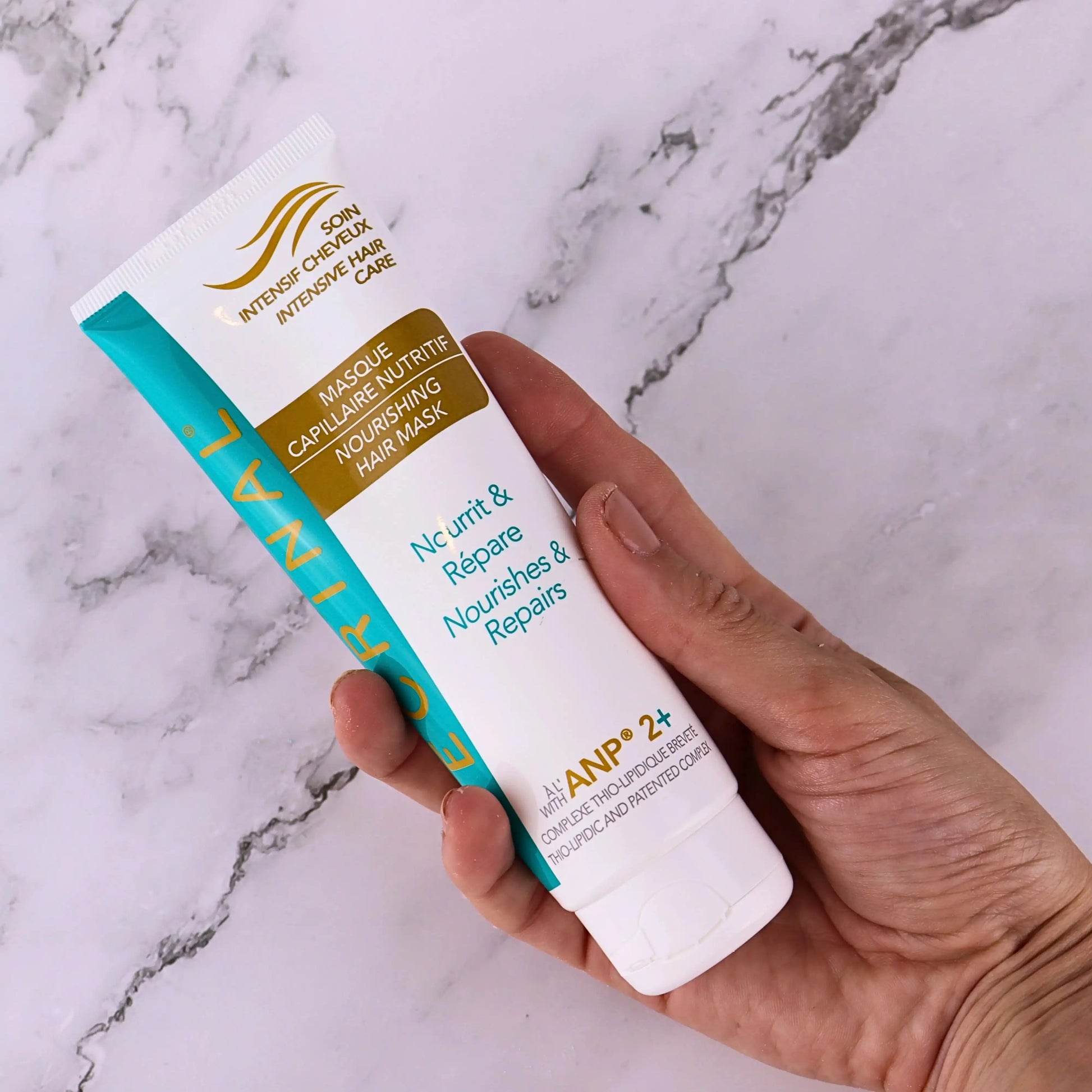 ECRINAL Nutritive Hair Mask by Celvess Cosmetic in 125ml jar, showing the nourishing hair treatment product with a sleek container.