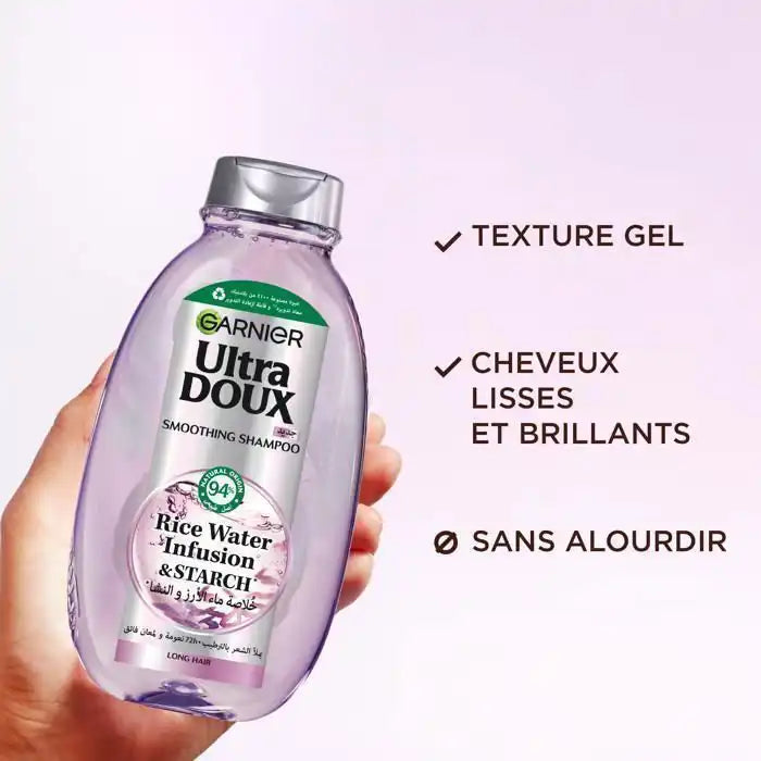 Garnier Ultra Doux Rice Water shampoo bottle, 400ml, with white and green packaging, designed for gentle hair cleansing.