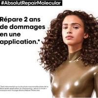 L'Oréal Professionnel Absolut Repair Molecular serum in a 250ml bottle, designed for damaged hair repair and nourishment.