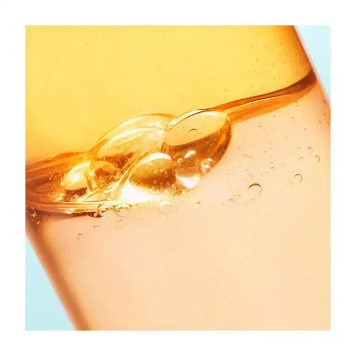 Nuxe Sun Huile Lactée Capillaire Protectrice Hydratante in 100ml bottle, lightweight hair oil with protective and hydrating formula.