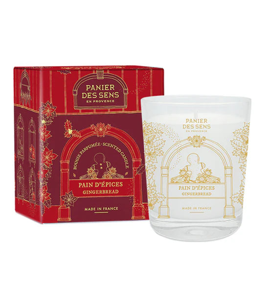 Scented candle from Panier des Sens by Celvess Cosmetic with warm, spicy pain d'épices fragrance in a decorative glass jar.