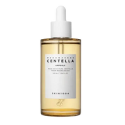 Skин 1004 Centella Ampoule 55ml in a clear glass bottle, featuring a pump dispenser, used for soothing and hydrating skin.