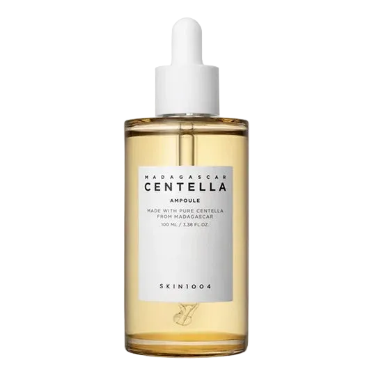 Skин 1004 Centella Ampoule 55ml in a clear glass bottle, featuring a pump dispenser, used for soothing and hydrating skin.
