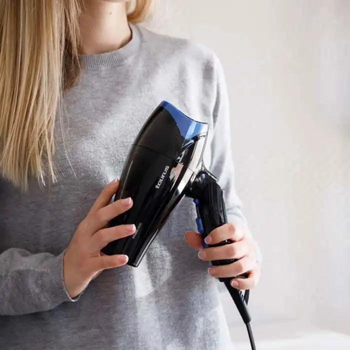 Celvess Cosmetic Studio 2500 hair dryer with 2400W power, ionizer, and fast drying technology, shown in the image.