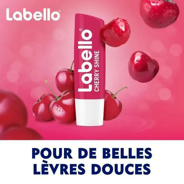 Multicolored Labello Fruity Shine Cerise lip balm with SPF 10, featuring a glossy finish and natural lip protection.