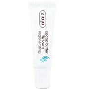 ZIAJA repair lip balm with cocoa butter in a tube, designed to nourish and soothe chapped lips.