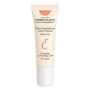 Pink-tinted Embryolisse anti-cernes concealer in an 8ml tube, designed to brighten and correct dark circles.