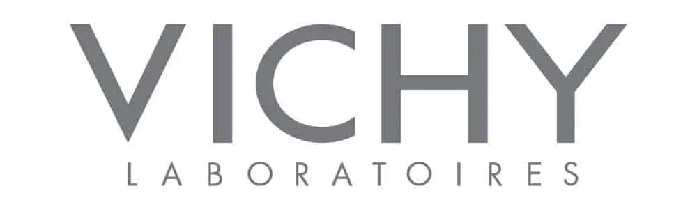 Logo Vichy Laboratoires en lettres grises, fond blanc, marque dermocosmétique.